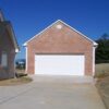 brick front custom garage